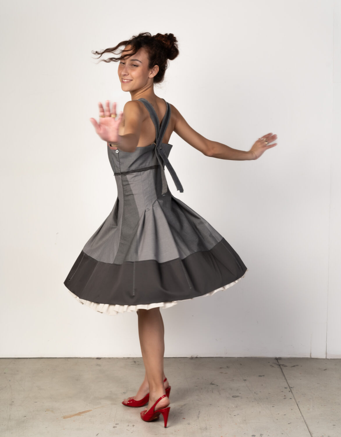 Abito con dettagli plissé